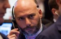 A trader works on the floor of the New York Stock Exchange.