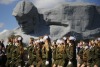 Belarusian cadets march past Brest Fortress monument during a Victory Day rally marking 71 years after the victory in ...