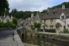 Known as the prettiest town in England, Castle Combe is a village parish in Wilshire. This view from Smarts bridge is ...