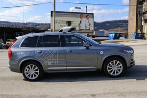 An Uber self-driving Volvo drives in Pittsburgh Friday, March 17, 2017.