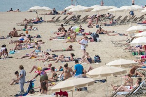 'Beaching' is a favourite pastime for tourists visiting the city: La Marbella beach in Barcelona.