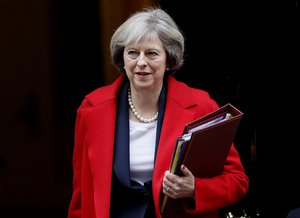 Britain's Prime Minister Theresa May leaves 10 Downing Street to attend the weekly Prime Ministers' Questions session, in parliament in London.