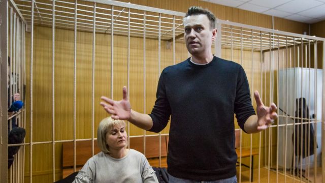 Russian opposition leader Alexei Navalny with his lawyer Olga Mikhailova in court on Monday.