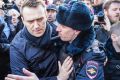 Alexei Navalny is detained by police in downtown Moscow.