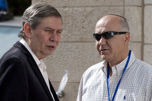 Director of Israel's Mossad secret service agency Tamir Pardo, left, stands with chief of Israel's Shin Bet internal security service Yoram Cohen as they attend a ceremony installing the new superintendent of the Israel Police, not pictured, at the Prime Minister's office in Jerusalem, Sunday, May 1, 2011.