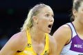 Back: Laura Langman of the Lightning looks to pass during the round one of the Super Netball match between the Firebirds ...