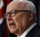 Prime Minister Malcolm Turnbull and Attorney-General Senator George Brandis address the media during a joint press ...