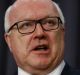 George Brandis is at the centre of a political storm over his involvement in the Bell Group litigation.