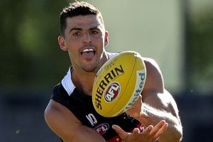 MELBOURNE, AUSTRALIA - FEBRUARY 08: Scott Pendlebury of the Magpies handballs during the Collingwood Magpies AFL ...