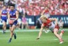 Jason Johannisen makes a break for the Bulldogs