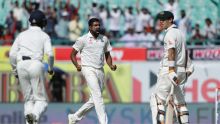 India's Ravichandran Ashwin, center, celebrates the dismissal of Australia's Glenn Maxwell during the third day of their ...