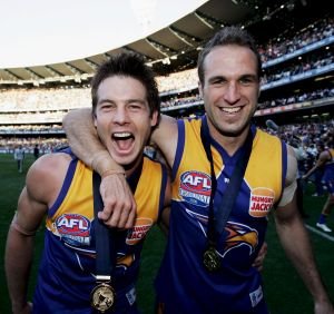 Ben Cousins and Chris Judd during happier times celebrating the Eagles' 2006 grand final win.