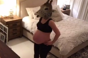 Erin Dietrich's impersonation of April the giraffe has made her an internet sensation.