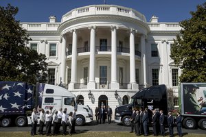 President Donald Trump walks out of the White House in Washington, Thursday, March 23, 2017, to meet with truckers and industry CEOs regarding healthcare, on the South Lawn.