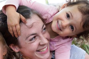 Childcare worker, Lucy Gosling, with kids, (L-R) Gabriel, Etta and Jemima, at the Clovelly Child Care Centre.