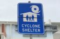 Only a trickle of people had made their way to the Bowen evacuation centre by late Monday afternoon as Cyclone Debbie ...