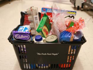 Grocery basket full of groceries from a Woolworths supermarket in Sydney.