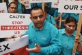 Sanjeev Sharma at the protest at Caltex head office in Sydney.