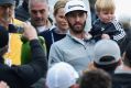 PACIFIC PALISADES, CA - FEBRUARY 19: Dustin Johnson and his son Tatum walk down to the 18th hole during the final round ...