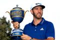 Dustin Johnson with his trophy.