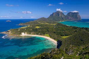 View south over Lord Howe Island with the peaks of Mount Lidgbird and Mount Gower in the distance.