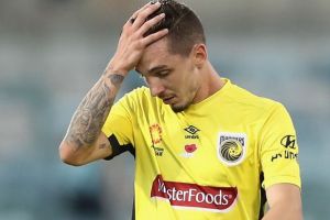 CANBERRA, AUSTRALIA - NOVEMBER 12: Storm Roux of the Mariners looks dejected after defeat during the round six A-League ...