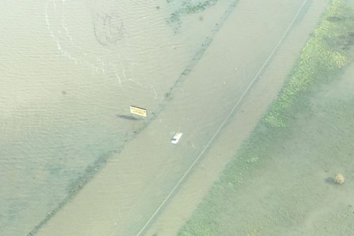 Car in floodwaters