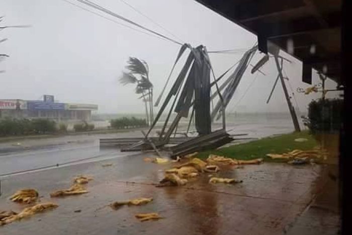 Strips of roofing tin hanging over power lines.