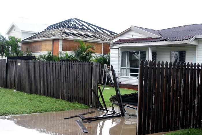 Two houses in Bowen with roofs ripped off.