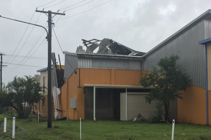 The roof of the Bowen Squash courts is torn from the structure.