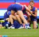 MELBOURNE, VICTORIA - OCTOBER 01: Bulldogs players celebrate the win on the final siren during the 2016 AFL Grand Final ...