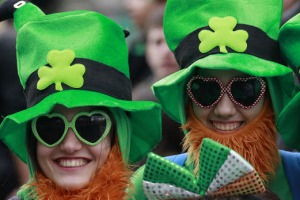 People dress in the emerald green to honour Ireland's Saint Patrick, as they enjoy the atmosphere during the St ...