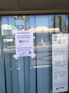 AUWU leaflet in window of Sarina Russo offices