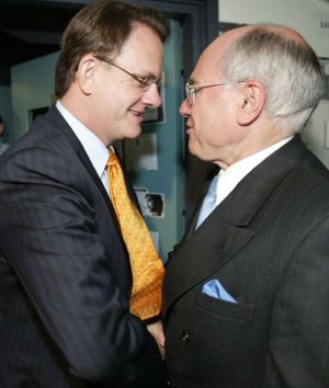 Opposition Leader Mark Latham giving then Prime Minister John Howard a power handshake during the 2004 election ...