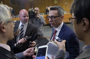 Clint Watts, a Senior Fellow at the Foreign Policy Research Institute Program on National Security, talks with reporters on Capitol Hill in Washington, Thursday, March 30, 2017, following his testimony before the Senate Intelligence Committee hearing on Russian intelligence activities.