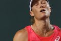 KEY BISCAYNE, FL - MARCH 27: Samantha Stosur of Australia reacts against Simona Halep of Romania during Day 8 of the ...