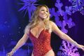 Mariah Carey performs during the opening show of <i>Mariah Carey: All I Want For Christmas Is You</i> at Beacon Theatre ...