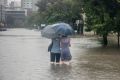 Rain from ex-cyclone Debbie floods Windsor.