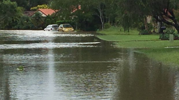 Cars are caught up in the floods in Ocean Shores on the NSW North Coast.