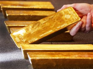 File - Various gold bars, are displayed in the German central bank's headquarters in Frankfurt, Germany, Thursday, Feb. 9, 2017. Various gold bars, are displayed in the German central bank's headquarters in Frankfurt, Germany, Thursday, Feb. 9, 2017.