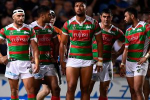 Grim night: Robbie Farah was on the field long enough to join the Bunnies behind the goal line.