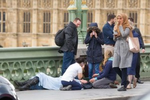 A woman wearing a hijab walks past the scene of the London attacks (Jamie Lorriman)