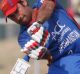 Afghanistan's captain Asghar Stanikzai hits a six during their fifth one day international cricket match against Ireland ...