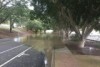 Water spills over the banks of the Bremer River, Ipswich.