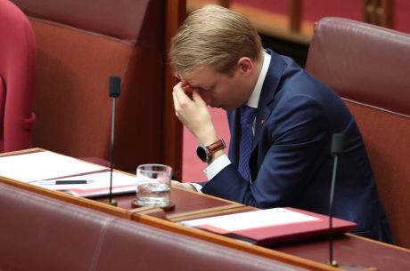 Senator James Paterson takes a moment in the Senate.