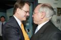 Opposition Leader Mark Latham giving then Prime Minister John Howard a power handshake during the 2004 election ...