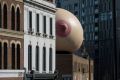 Inflatable boob erected on a building in London to promote breastfeeding. 