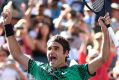 Roger Federer enjoys the moment after defeating Stan Wawrinka in the men's final of the BNP Paribas Open at Indian Wells.