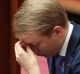 Senator James Paterson takes a moment in the Senate.