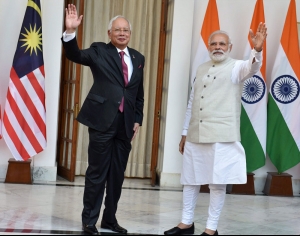 Prime Minister Narendra Modi with his Malaysian counterpart Najib Razak before their meeting...